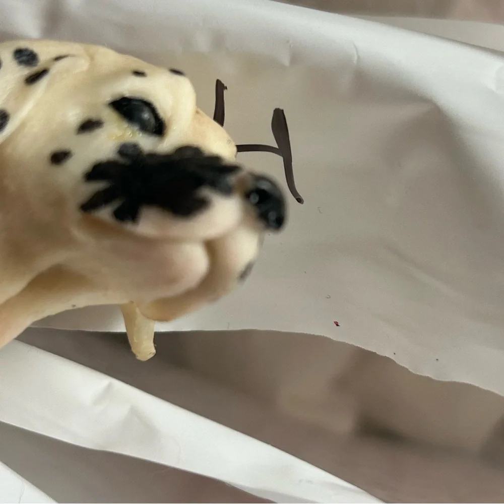 Spotted Dog Figurine on Wooden Base